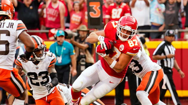 Sep 12, 2021; Kansas City, Missouri, USA; Kansas City Chiefs tight end Travis Kelce (87) scores a touchdown against the Cleveland Browns during the second half at GEHA Field at Arrowhead Stadium. Mandatory Credit: Jay Biggerstaff-USA TODAY Sports
